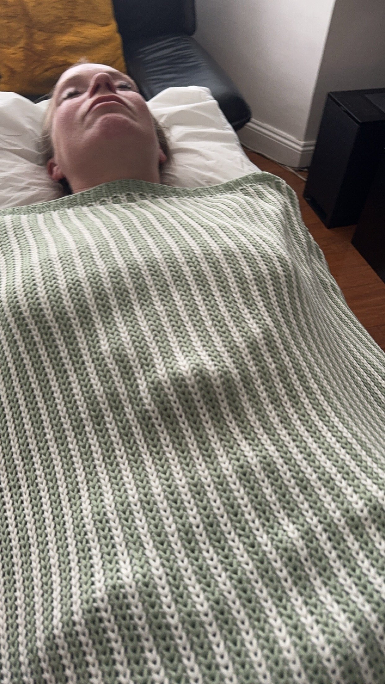 Lady Laying on Therapy Couch/ bed in a meditative state, whilst receiving Reiki Healing